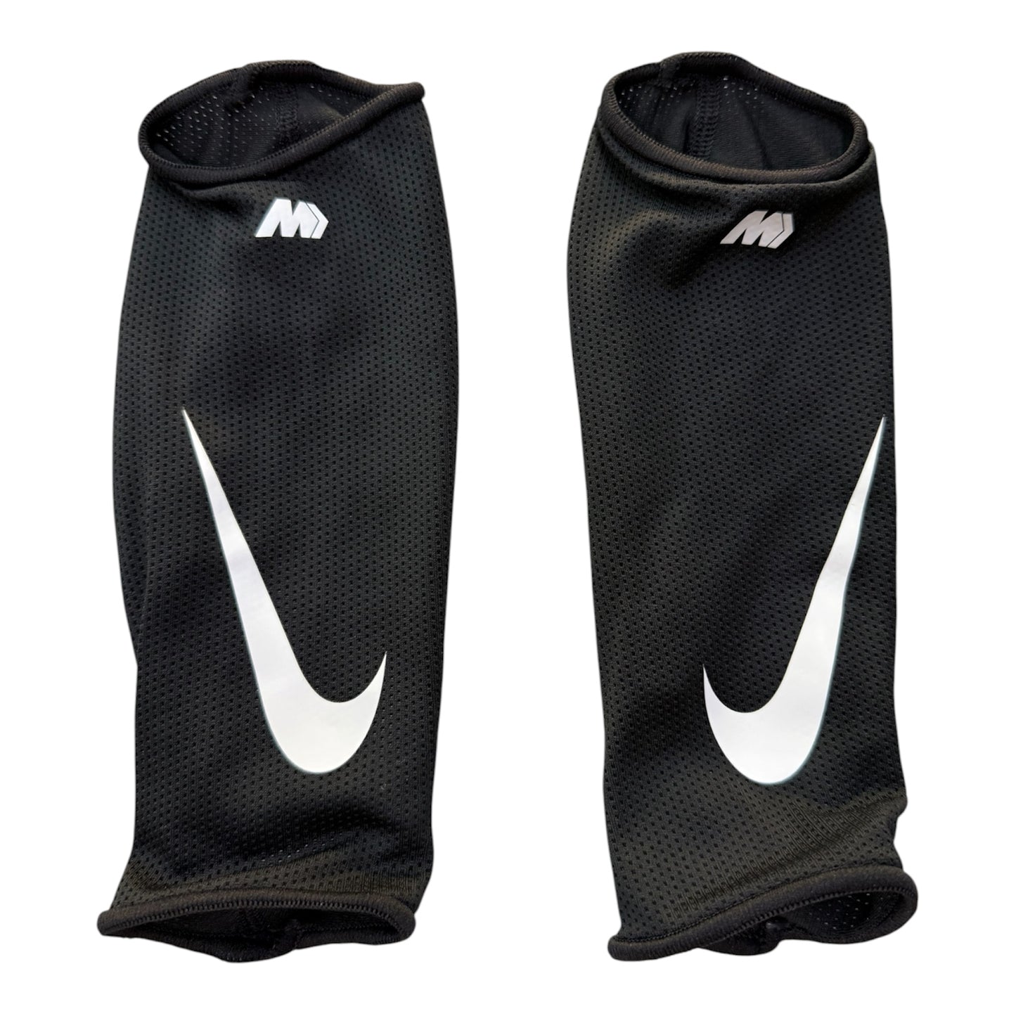 Espinillera Nike