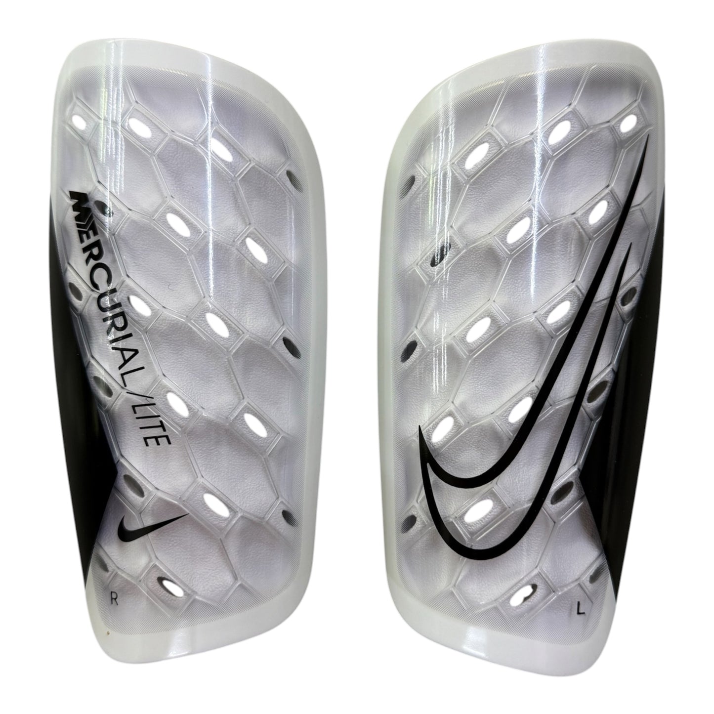 Espinillera Nike