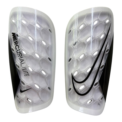 Espinillera Nike