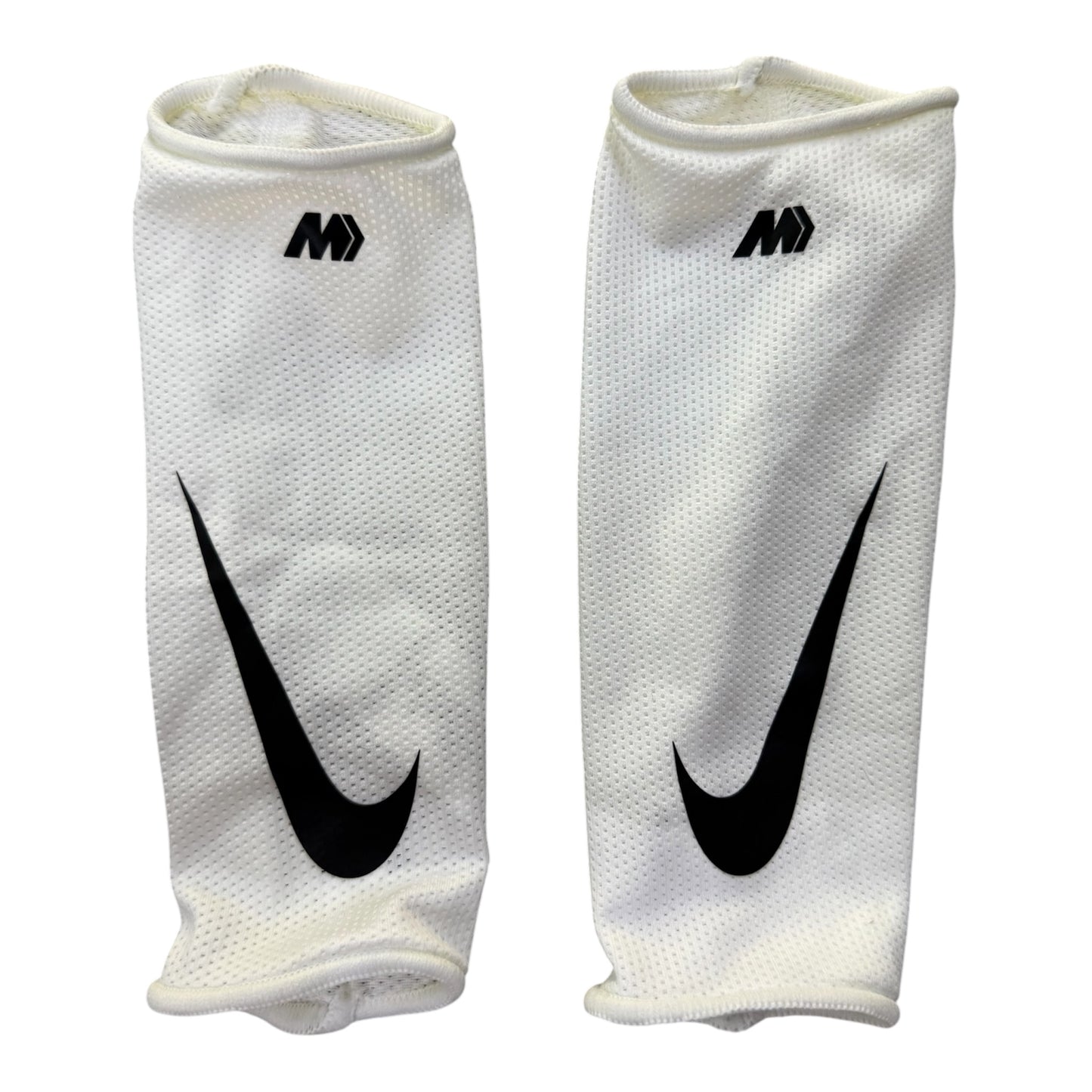 Espinillera Nike
