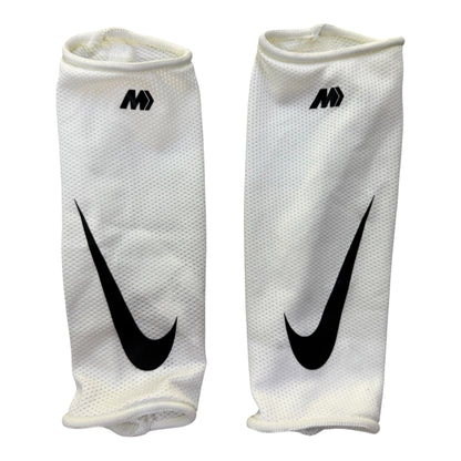 Espinillera Nike
