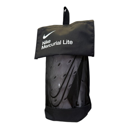 Espinillera Nike